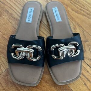 Steve Madden Gene black slides with gold chain buckle